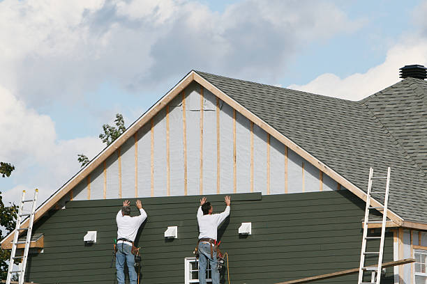 Professional Vinyl Siding technician working in Newton Highlands, MA